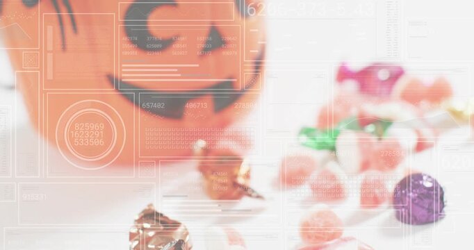 Overlay appearing, camera dollying and panning toward pumpkin bucket highlighting overflowing candy