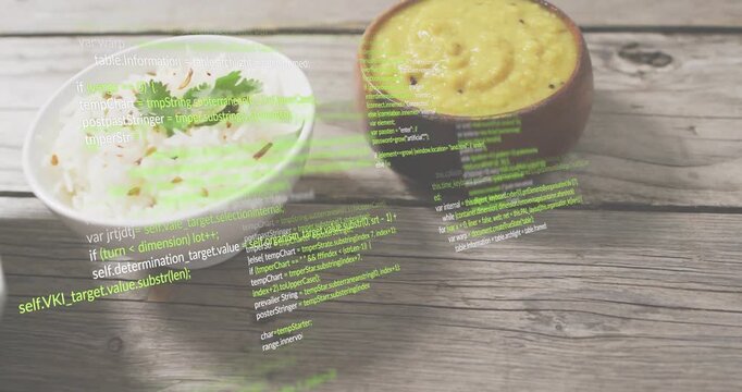 Translucent green code scrolling over rice, dal and curry sliding in showing digital cuisine