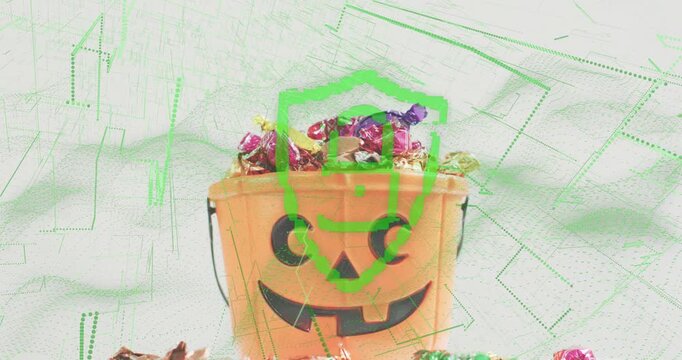 Green shield appearing at pumpkin bucket, launching candy scan causing wrappers tumbling, fading