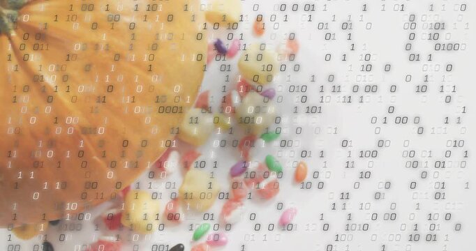 Binary digits drifting down over pumpkin and candies, starting at second frame for digital overlay
