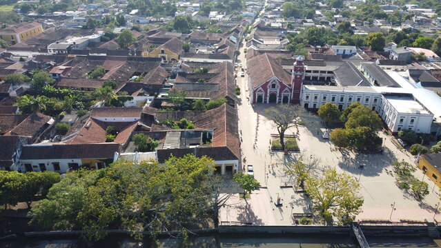 Aerial view of the historic city of Santa Cruz de Mompox in sunlight with the river and the Iglesia de Santa B&aacute;rbara (Church of San B&aacute;rbara) Colombia, a World Heritage Site