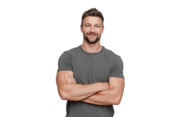 A handsome man with short brown hair and a beard, wearing a grey tshirt, standing with his arms crossed and smiling, isolated on transparent background
