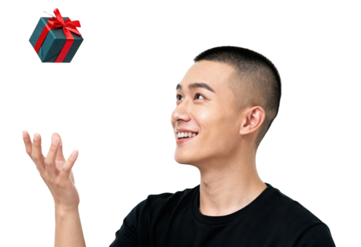 Excited Asian Man Catching a Christmas Gift in Mid-Air - Powered by Adobe