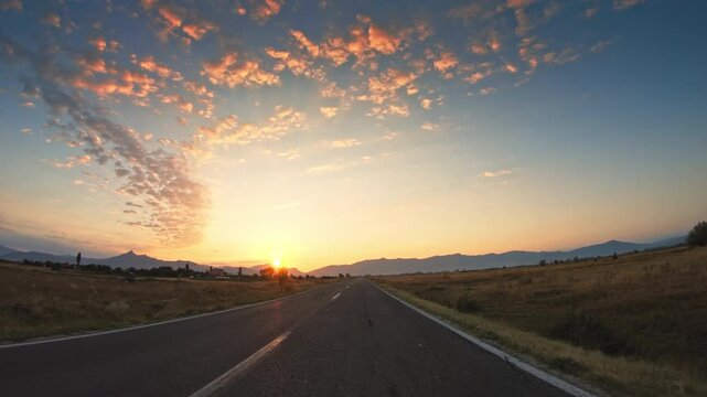 Rural landscape, flatland, summer sunset, POV driver perspective