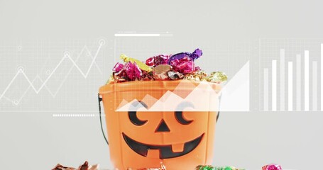 Starting clip showing pumpkin bucket with graph bars and nodes overlay morphing into data charts - Powered by Adobe