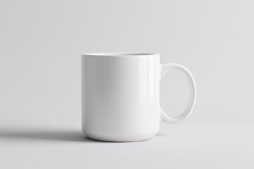 Fototapeta premium Plain white ceramic mug on neutral background