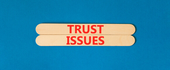 Trade wars symbol. Concept word Trade wars on beautiful wooden sticks. Beautiful blue paper background. Business trade wars concept. Copy space.