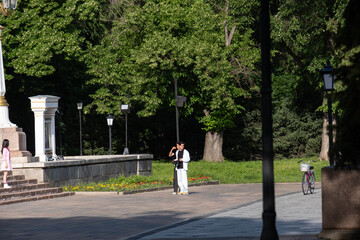 May 24, 2025 Almaty Kazakhstan. A group of young people with a camera are filming early in the morning.