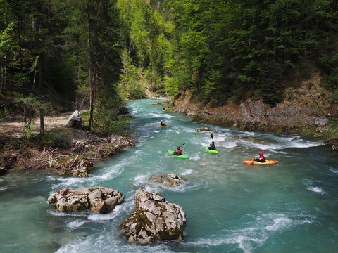 Kayakers Paddling on Mountain River in Austria, copy space
