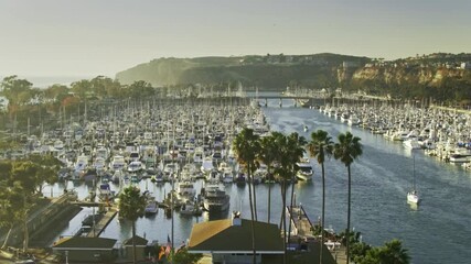 A stunning view of a marina filled with boats on a sunny day