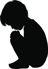Silhouette of a child kneeling in a thoughtful or prayerful pose