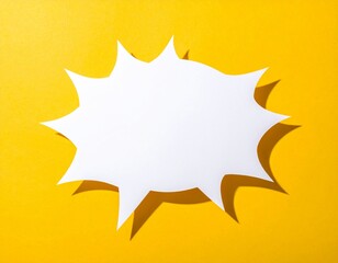 Flat lay of a comic speech bubble cutout on bright background
