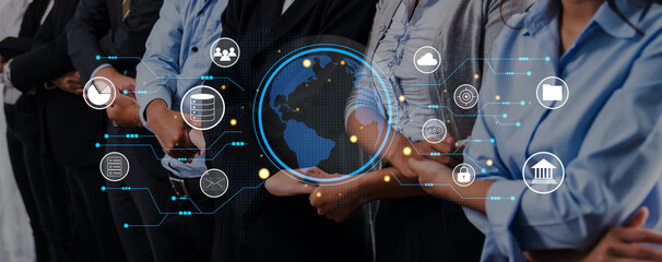 Group of professionals standing confidently in line, surrounded by digital overlays symbolizing global connectivity, showcasing modern business and technology themes. Trope