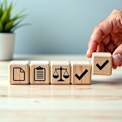 Business concept of regulatory compliance, illustrating the process of following rules, policies, and legal requirements with icons on wooden cubes