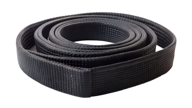 Black belt isolated on transparent background this is a martial arts belt, a symbol of achievement and skill in various disciplines, rolled up