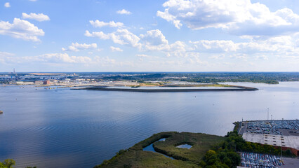 Aerial shot of warehouses and factories along the Patapsco River in Baltimore Maryland USA