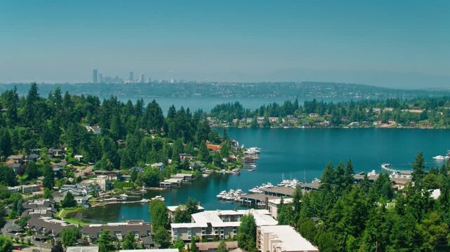 A scenic view of lake washington with the seattle skyline in the distance