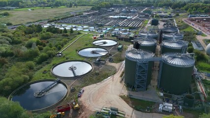 Aerial drone view of modern urban wastewater treatment plant, water purification, automatic removal of chemicals, solids, and gases from contaminated water
