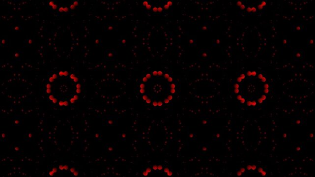 A mesmerizing display of intricate geometric patterns in deep crimson red, creating a visually rich design. The contrast between the darkness and the striking color draws the eye.