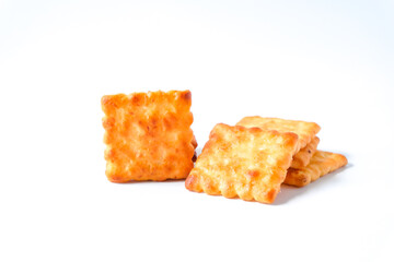 Square biscuits coconut over a white background.