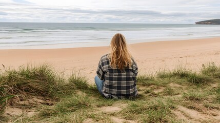 Fototapeta premium Woman Contemplating Ocean View Beach Scenery