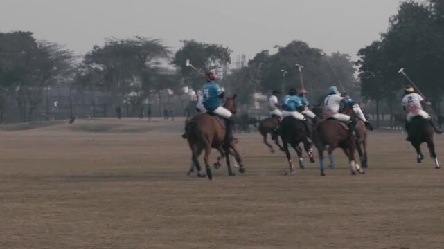 Closeup shot of players Playing Horse polo.