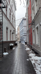Winter architecture view of historic Old Riga in snow.