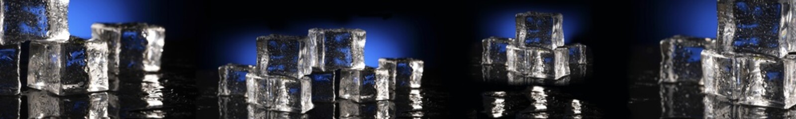 Clear ice cubes stacked in abstract arrangement with shimmering reflections on wet black surface and blue gradient background