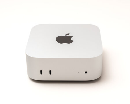 Front view of the Apple Mac Mini M4 workstation, photographed against a light gray background. Udine, Italy, September 25_2025