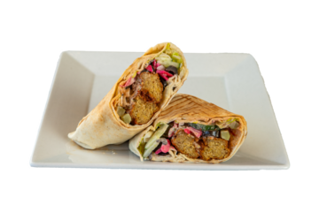 Delicious falafel wraps cut in half on a white plate against a on transparent background