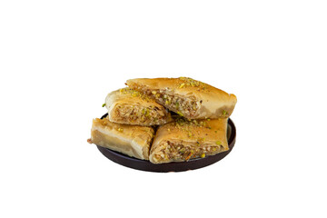 Delicious baklava pastries stacked on a small plate against a on transparent background