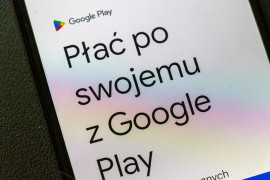 Warsaw, Poland - September 24, 2025: A close-up of a smartphone screen displaying the Google Play logo and a payment method message in Polish showcasing digital technology.