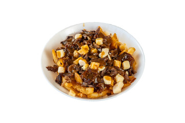 Delicious poutine with french fries gravy cheese curds and meat on white plate on transparent background