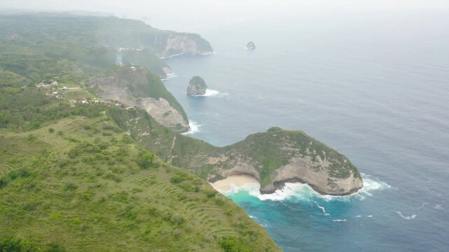 Aerial view of nusa penida islands coastline with its dramatic cliffs