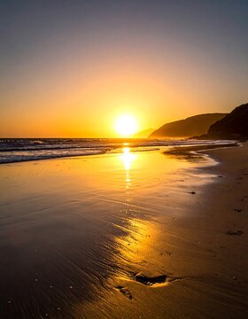 Golden sunset over a tranquil beach