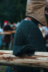 a man in chain mail during a knightly battle
