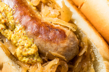 Homemade Beer Bratwursts on a Bun with Sauerkraut