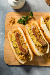 Homemade Beer Bratwursts on a Bun with Sauerkraut