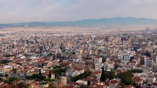 Aerial view of athens, greece, showcasing the cityscape and distant mountains