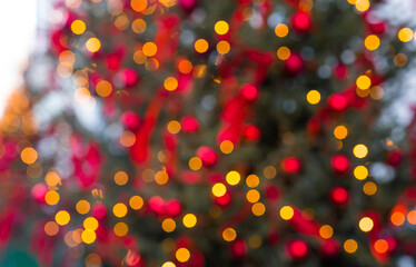 Beautiful Christmas background 2026. Abstract blurred Christmas background with warm-colored Christmas tree lights.