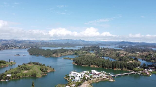 Medellin, Colombia, aerial view of Guatape lake from the Rock (La Piedra del Penol) during daytime drone 4K, tourism destination