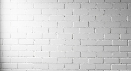 Obraz premium Illuminated White Brick Wall with a Soft Gradient Spotlight from the Left.