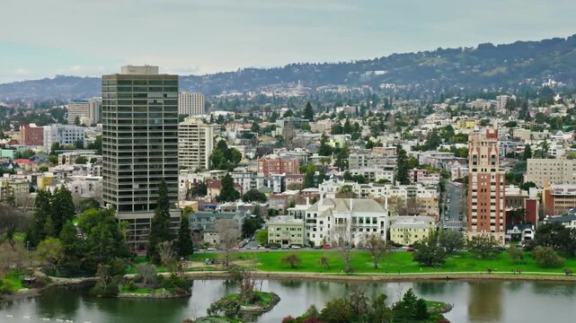 Scenic view of lake merritt and the oakland cityscape on a cloudy day