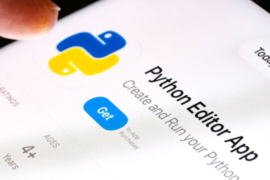 Python editor on iPad with Apples new Liquid Glass updated app design iOS 26 developer tool listing for Python in App Store. Stafford, United Kingdom, September 25, 2025.