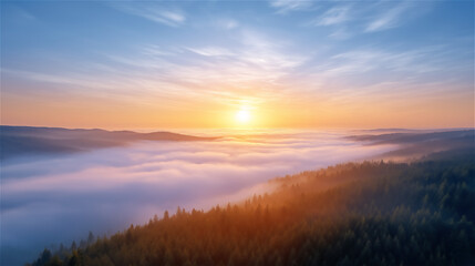 Fototapeta premium Beautiful sunrise over misty valley with golden sky, layers of hills creating depth and tranquility. Scenic landscape inspires hope and natural wonder.