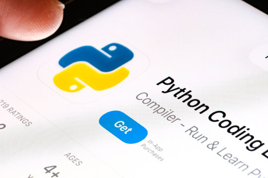 Python coding on iPad with Apples new Liquid Glass updated app design iOS 26 developer tool listing for Python in App Store. Stafford, United Kingdom, September 25, 2025.