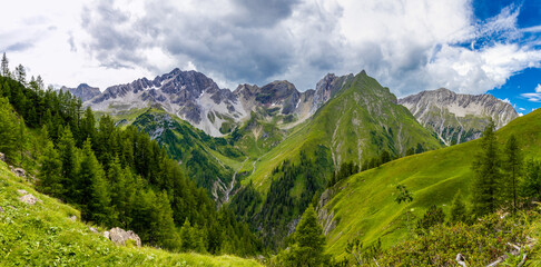 Panorama of Alps mountains on a sunny day. High resolution widescreen panorama of mountain...