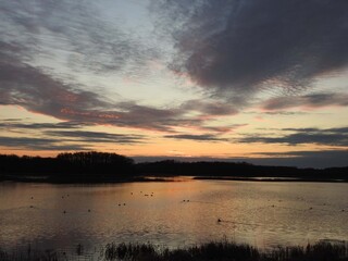 A magical moment occurs at twilight, once the sun has fallen below the horizon. Wetlands of the Bombay Hook National Wildlife Refuge, Kent County, Delaware.