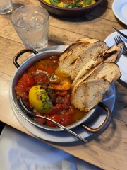 tomato seafood platter with bread