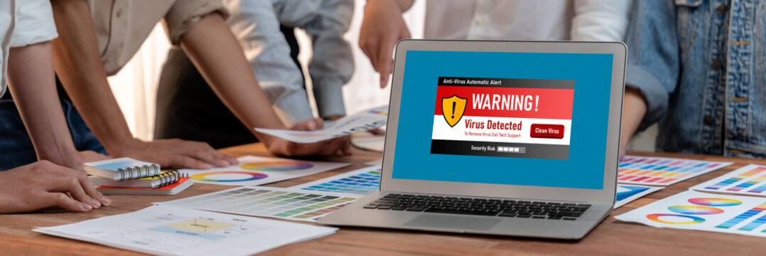 Virus warning alert on computer screen detected brisk cyber threat , hacker, computer virus and malware